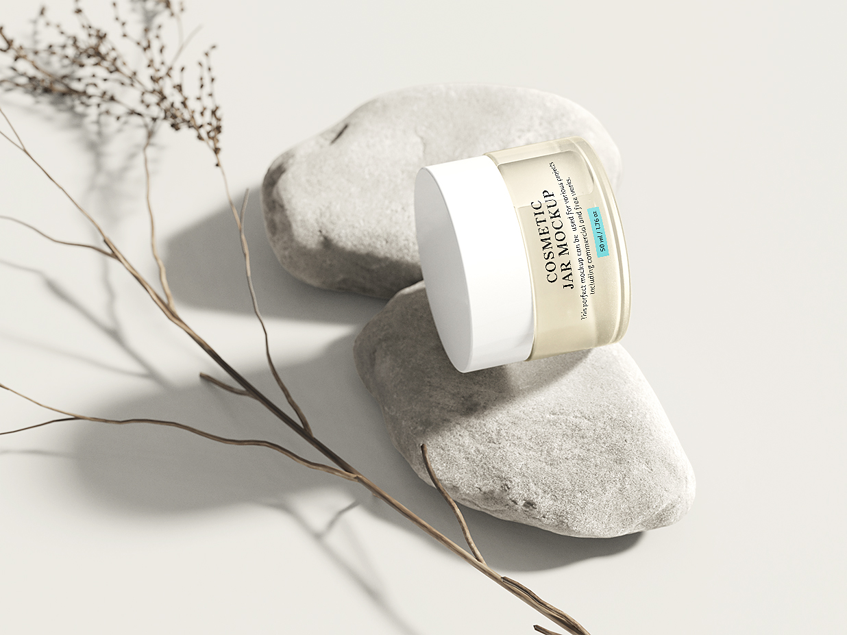 在石头上的面霜罐样机插图