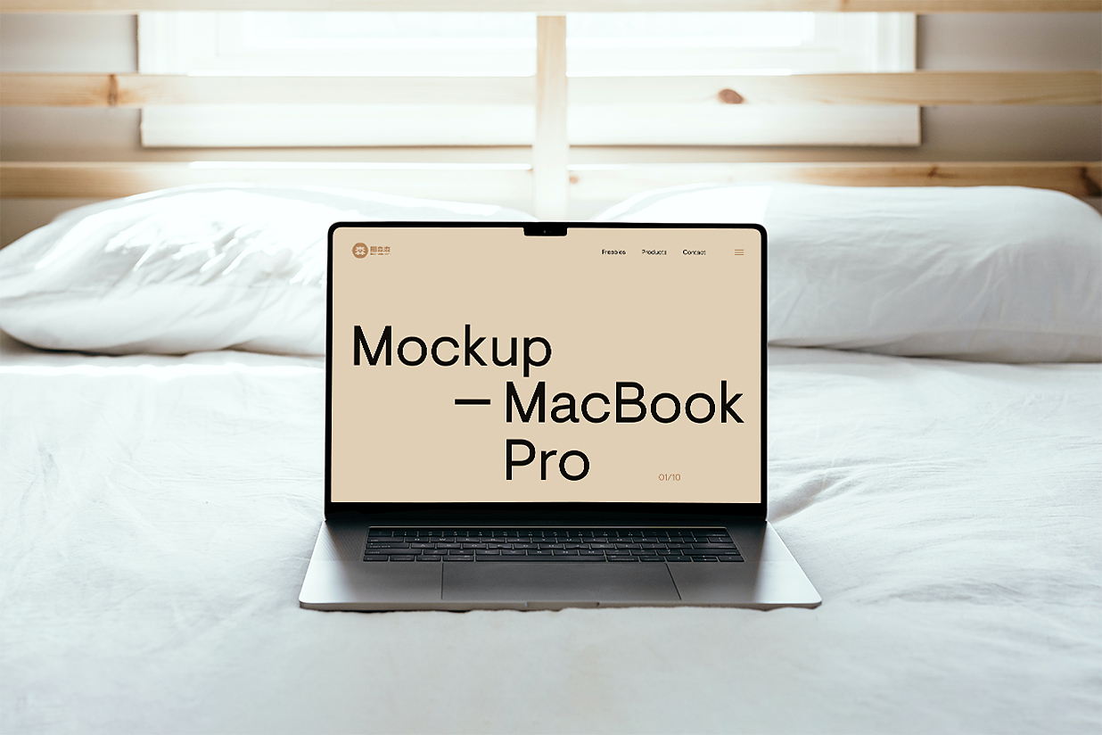摆在床上的MacBook Pro样机插图
