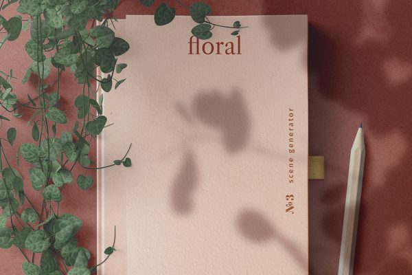 带绿植和铅笔的精装书籍样机