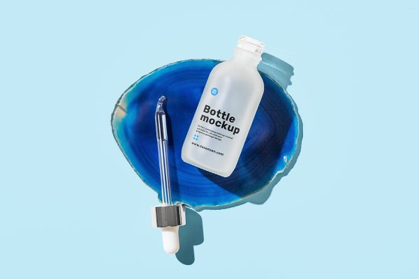 带场景的滴管瓶精华精油瓶样机mockup