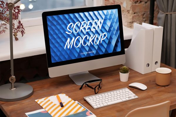 放在木桌上的iMac样机mockup