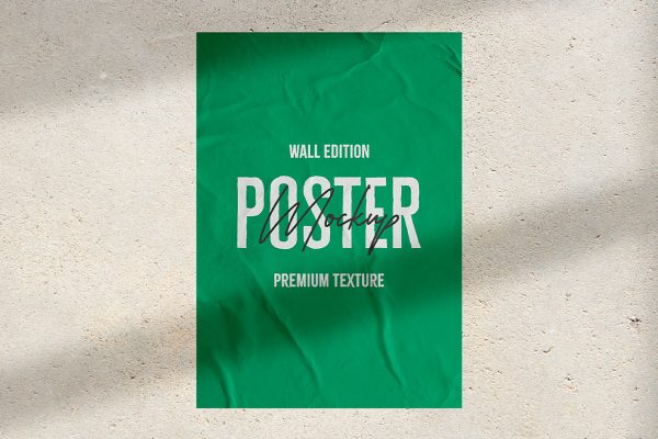 张贴在墙上的海报样机mockup